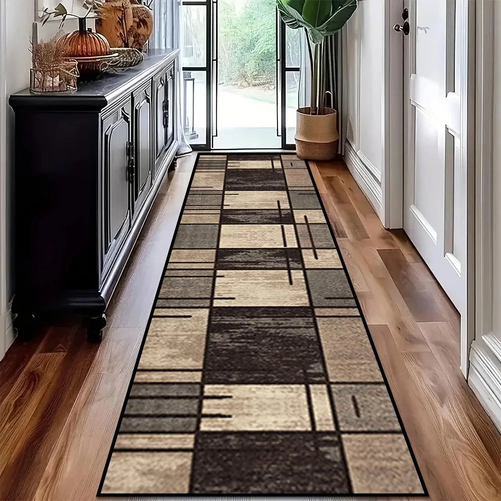 Modern geometric runner rug in brown and beige abstract pattern placed in a hallway