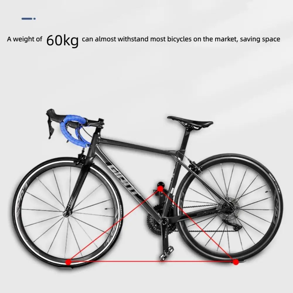 Road bike mounted on wall using wall pedal rack demonstrating weight support