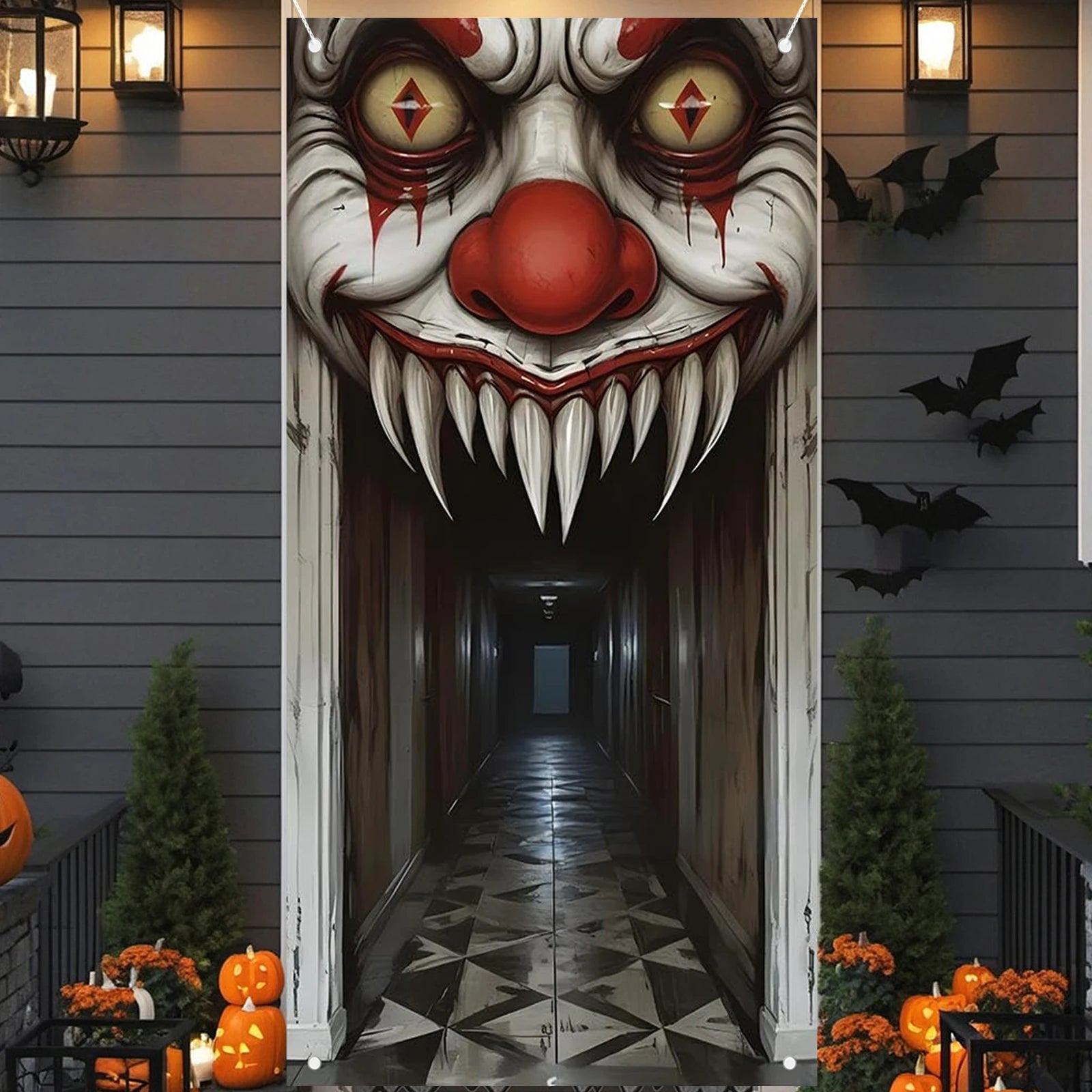 Clown door cover hanging on a home exterior door with outdoor Halloween decorations