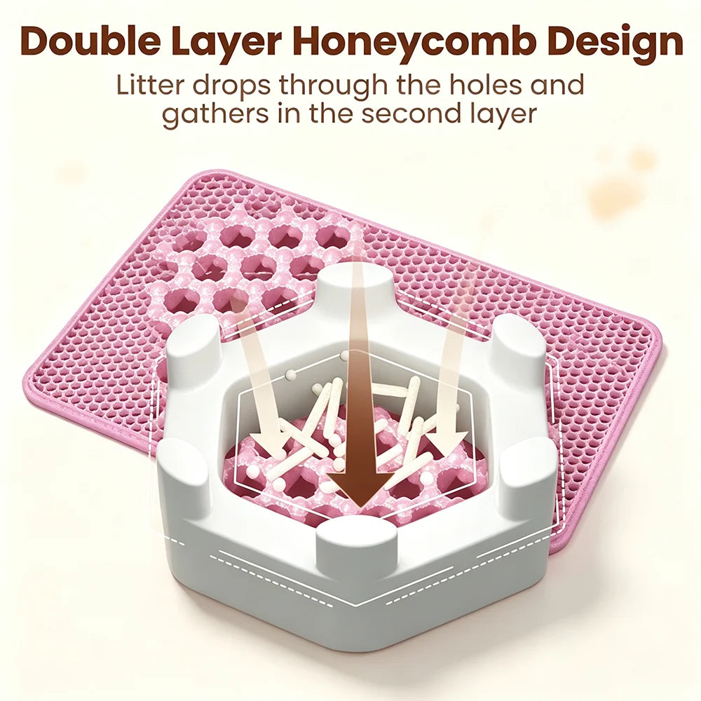 Close-up of pink double-layer honeycomb cat litter mat showing litter dropping through upper layer into bottom layer