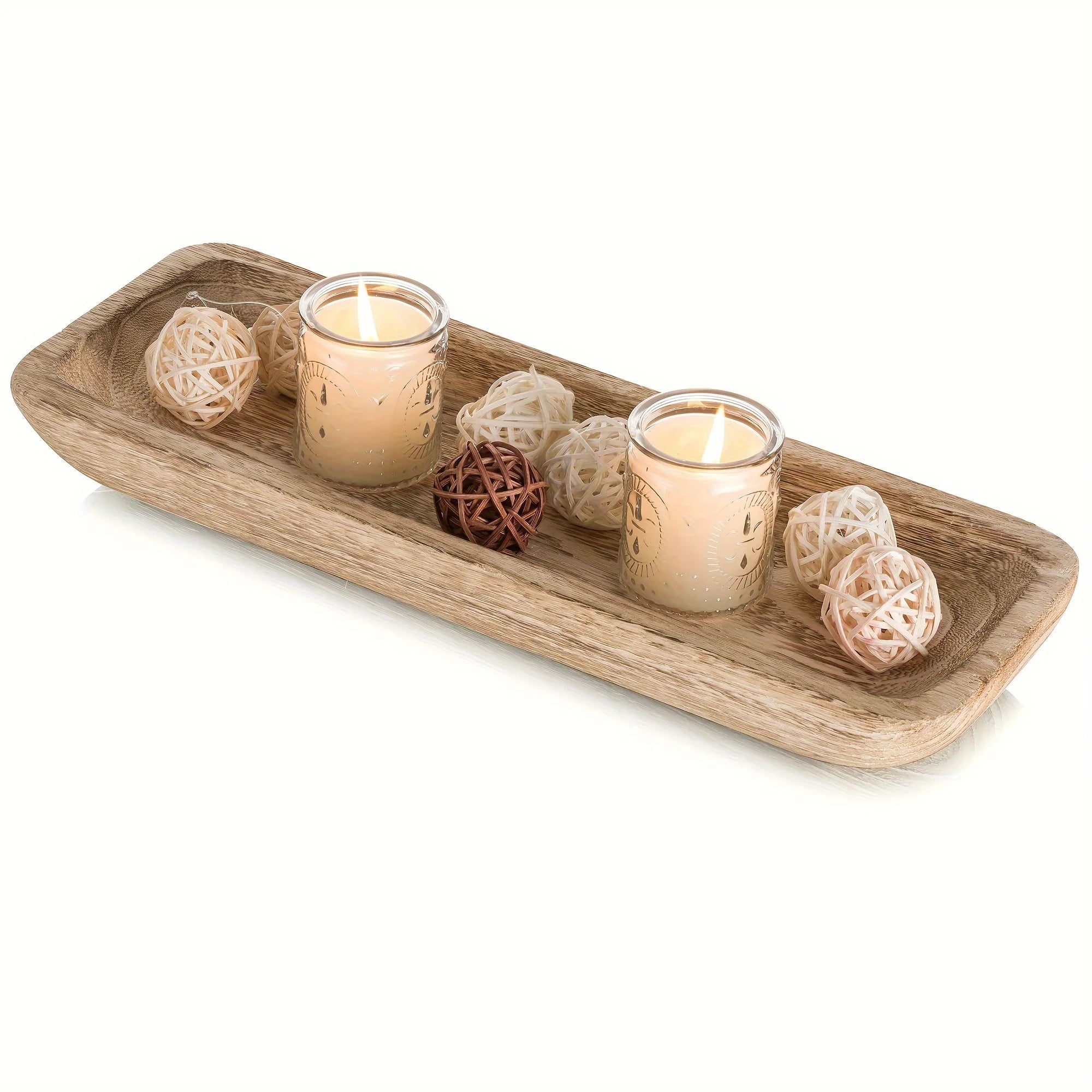 Top-down view of the wooden tray featuring candles and decorative rattan balls