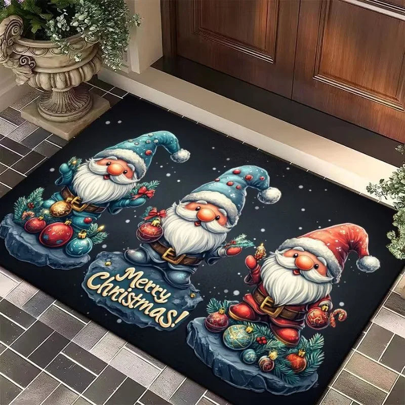 Black holiday door mat with three colorful gnomes in blue and red hats, ornaments, and 'Merry Christmas!' text at an entry