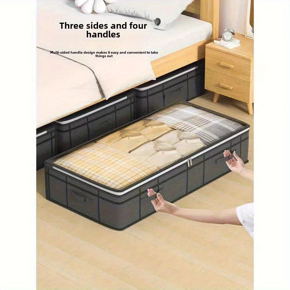 Under-bed storage bin being pulled out using side handles from beneath a bed