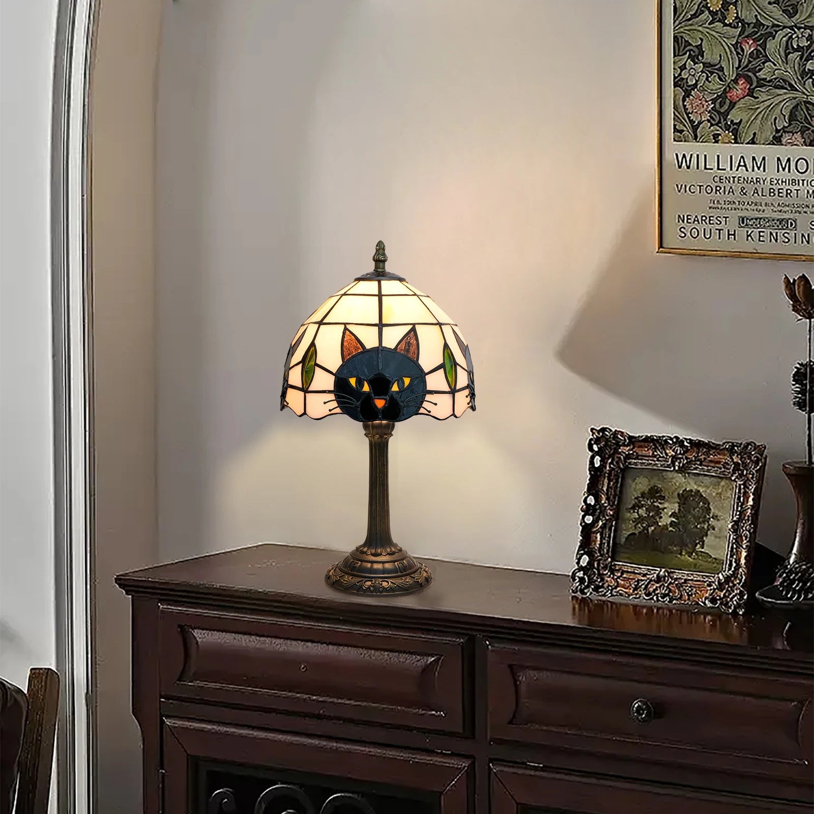 cat motif stained glass table lamp on dresser in cozy living space