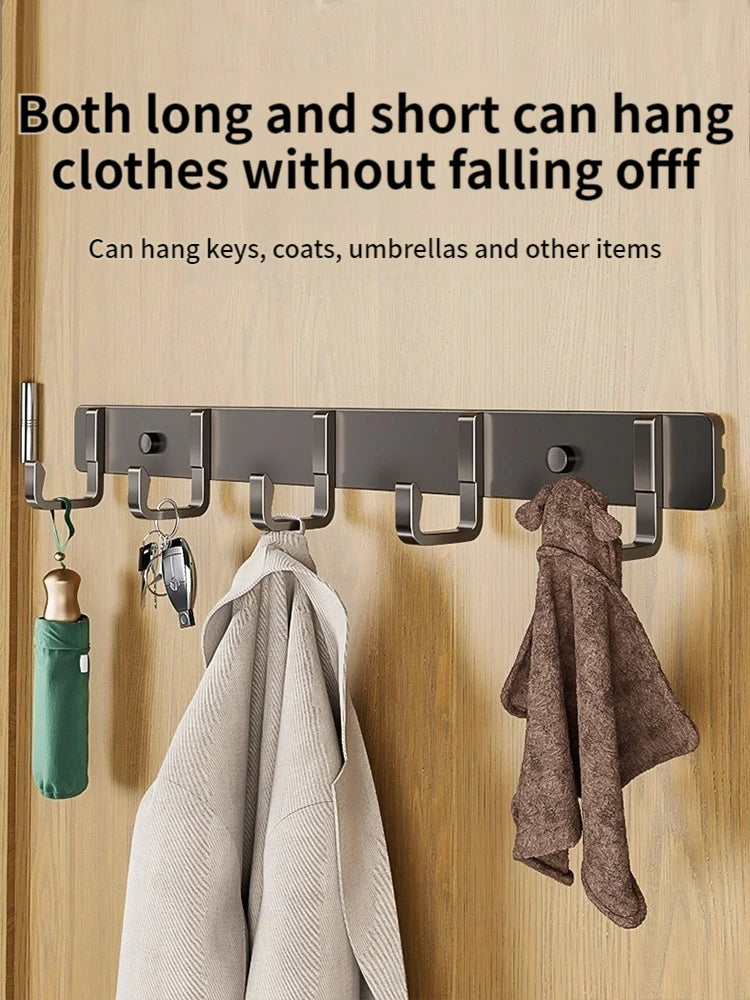 metal wall hooks with coats, keys, umbrella, towel and entryway storage text overlay