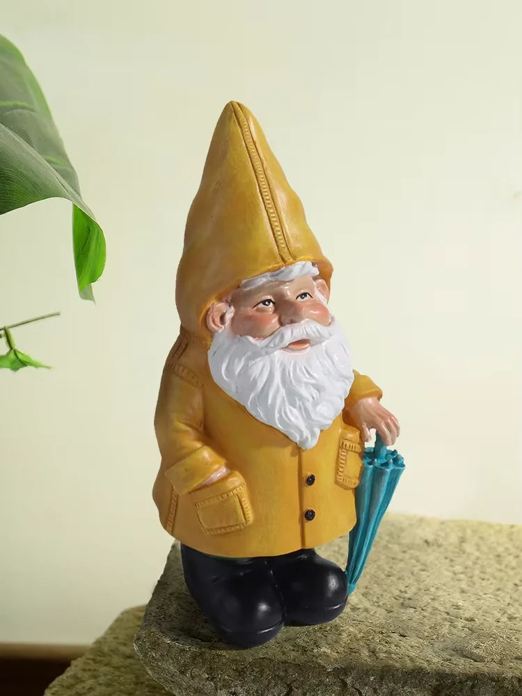 Garden Gnome Statue with Yellow Raincoat and Umbrella