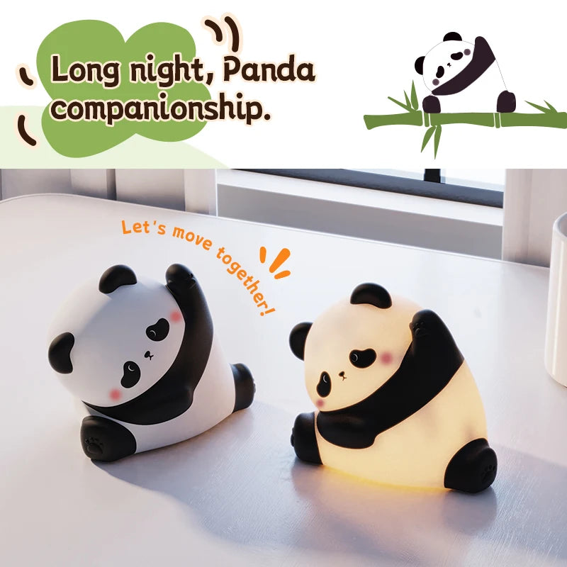 Two silicone panda night lights on a white table, one glowing, with playful illustrations