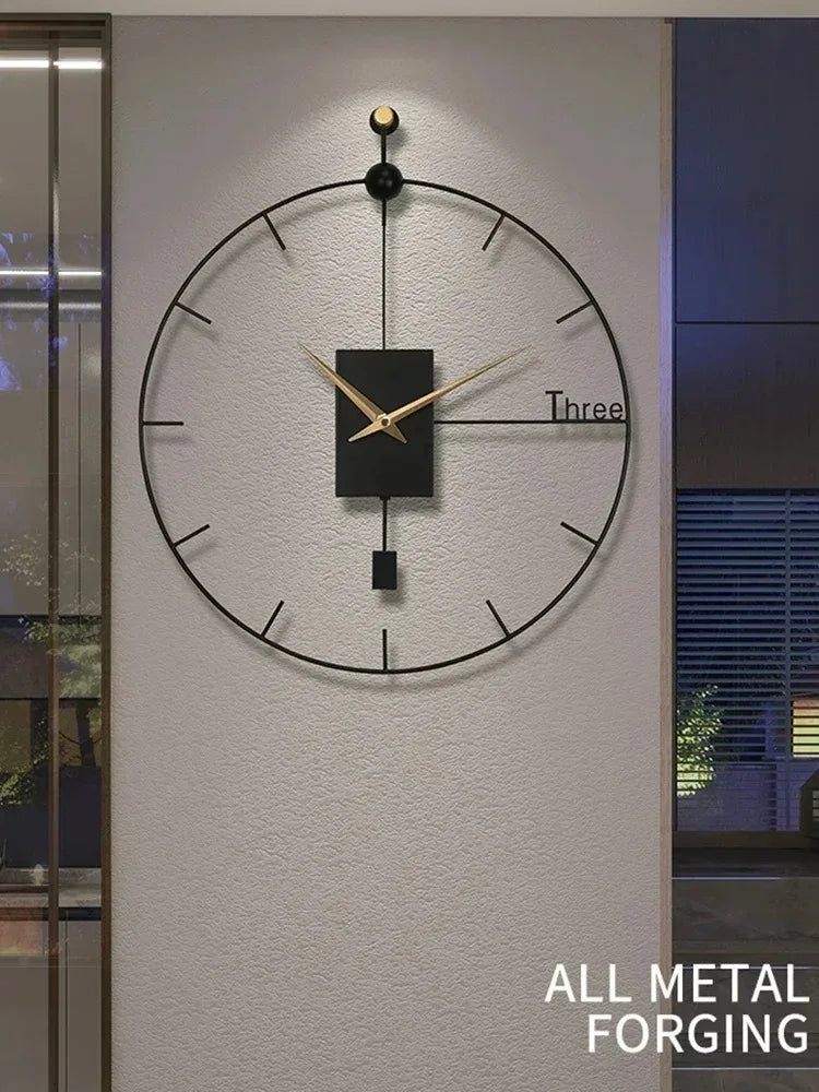 Geometric wall clock with black and gold accents displayed on softly lit wall