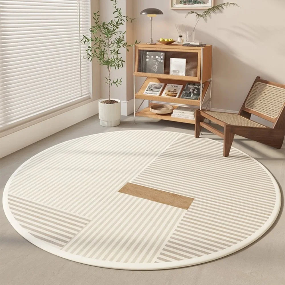 minimalist cream round rug with abstract black line pattern in a modern living room, wooden chair and shelf nearby