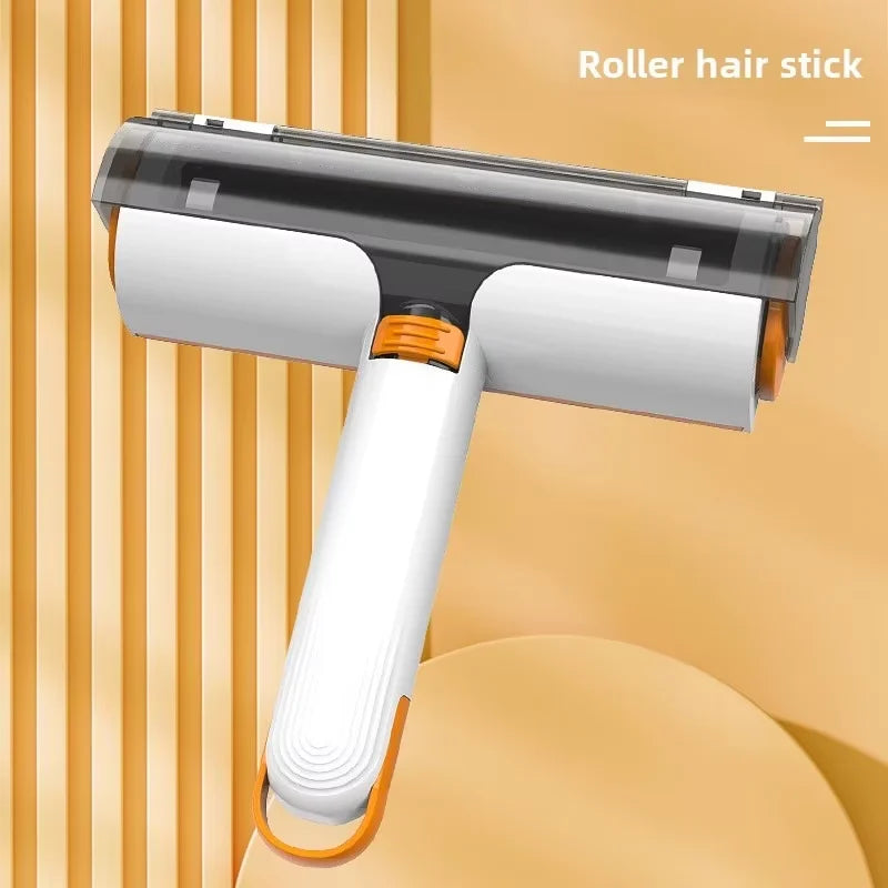 Double-sided lint roller brush with orange and white handle displayed on a neutral background