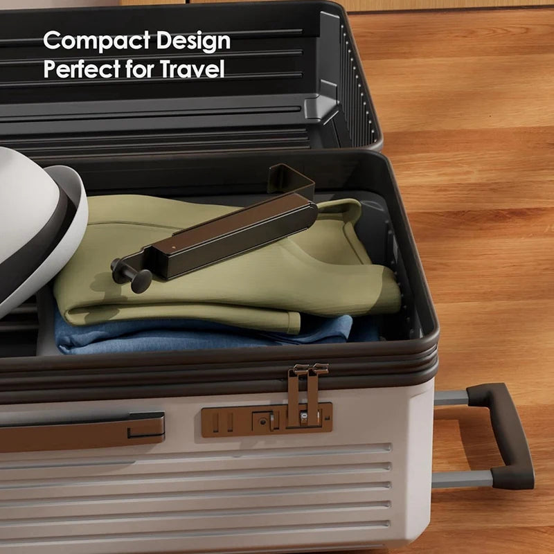 compact black-gray drying rack shown packed in a suitcase for travel