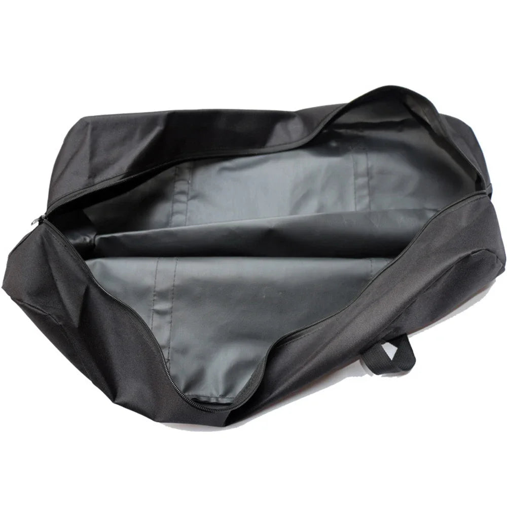 Interior view of an empty black oxford cloth storage bag with a zippered opening