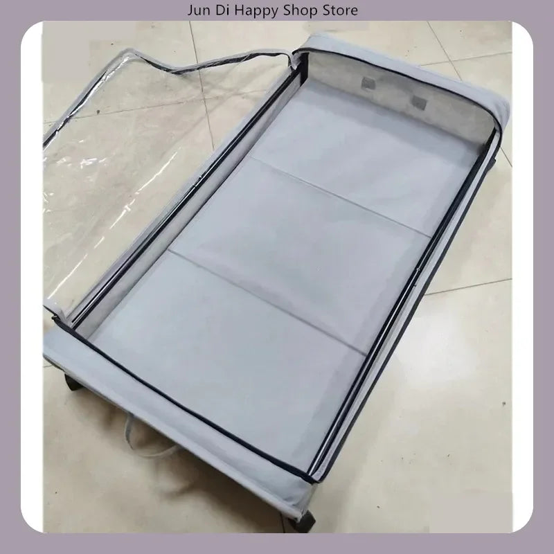 Empty gray underbed storage drawer with clear lid open, showing interior