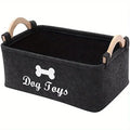 Soft felt dog toy storage basket with wooden handles and 'Dog Toys' label