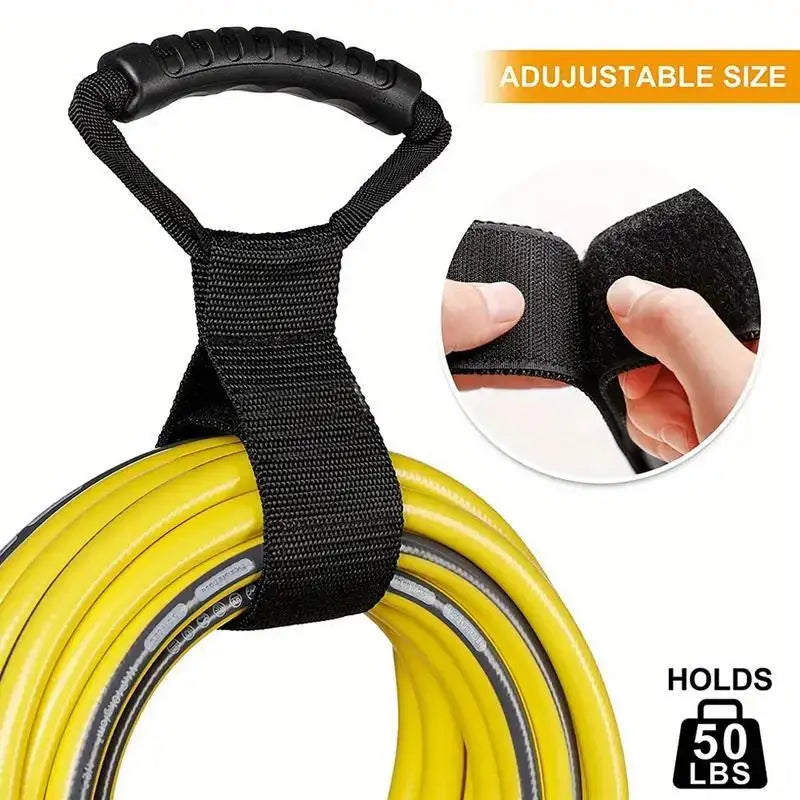 Black extension cord organizer strap with handle, shown holding yellow cord and being adjusted with hook-and-loop closure
