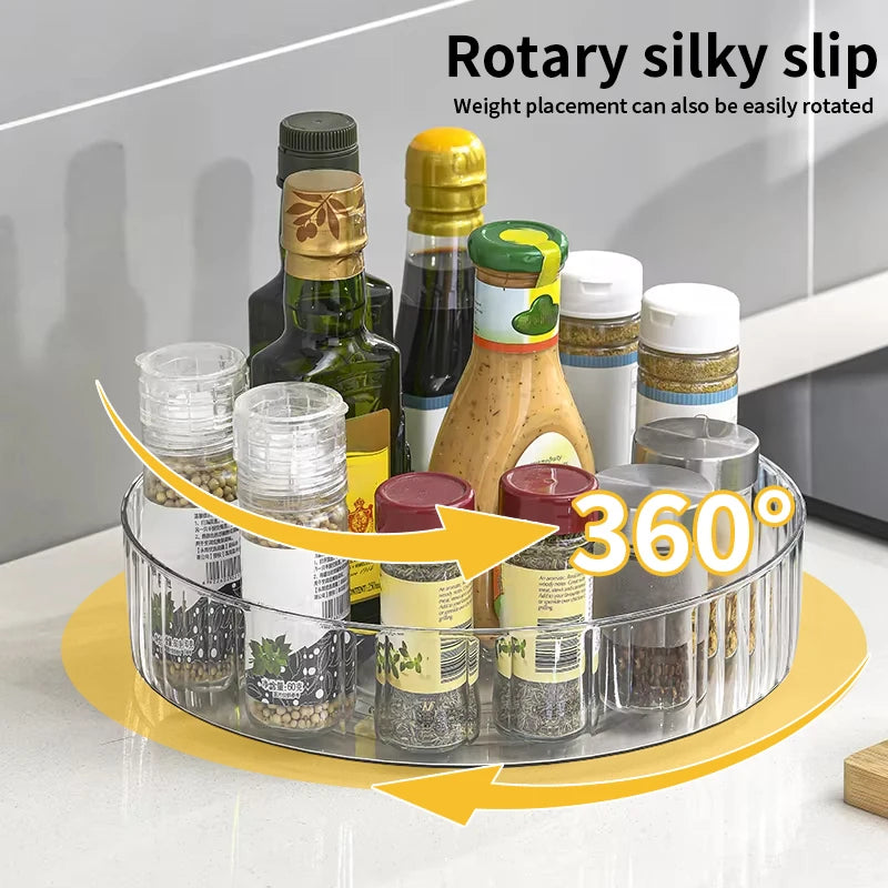Clear PET plastic rotating lazy susan tray holding spices and condiments on a kitchen counter