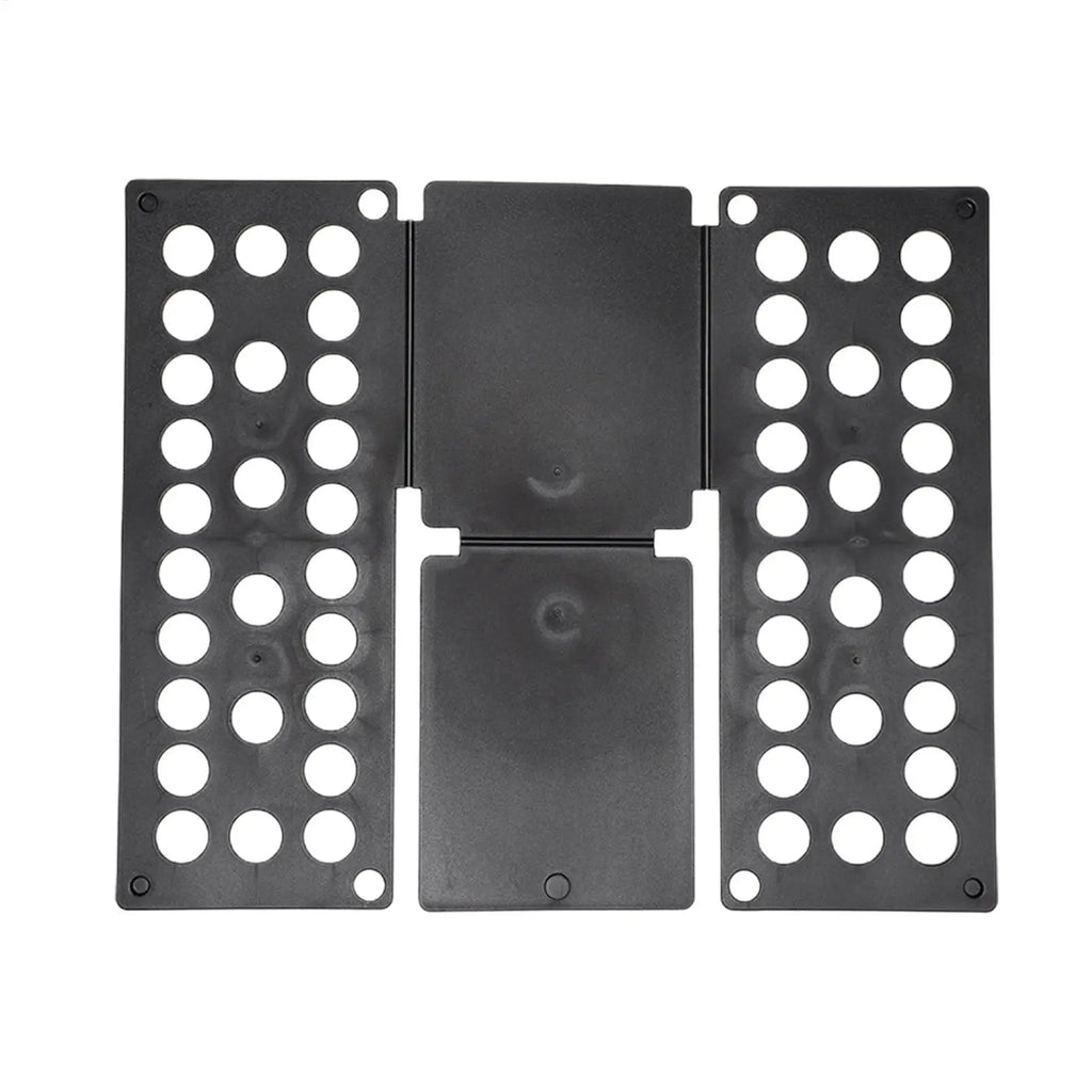 Black folding laundry board opened flat with circular holes visible