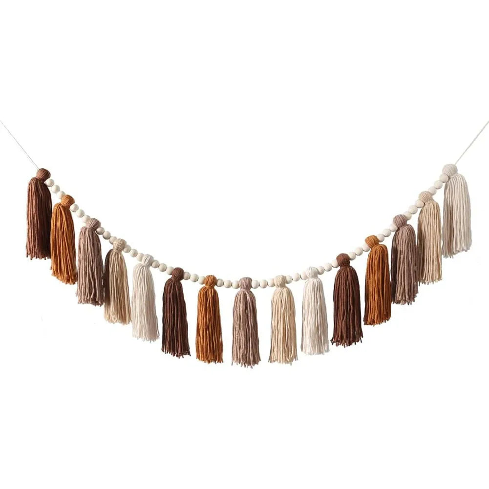 boho tassel garland in brown, beige, and cream with wooden beads
