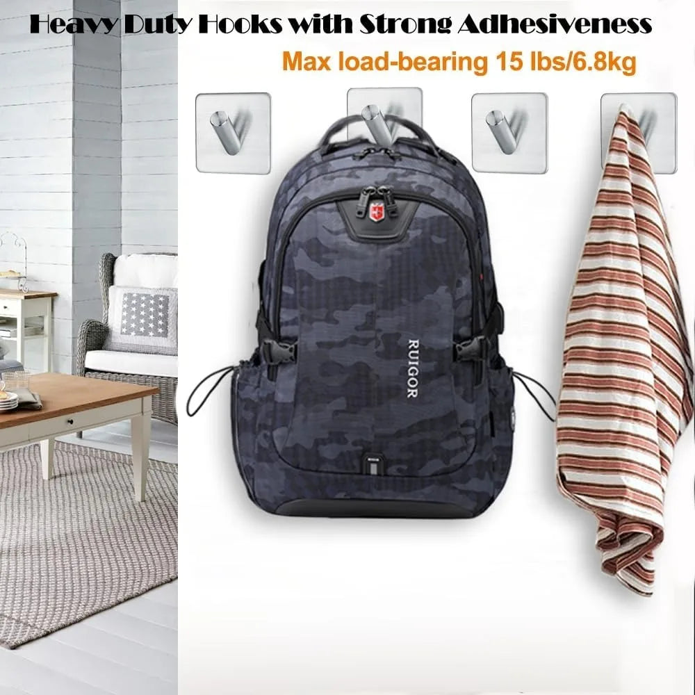 Adhesive metal hooks in living room setting holding a dark backpack and striped towel