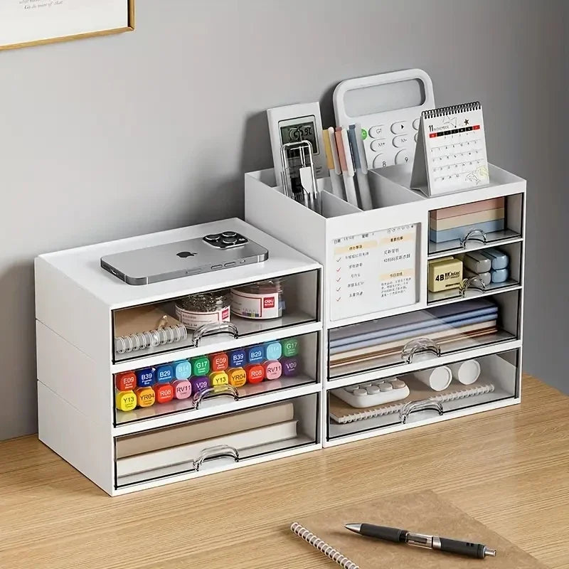 Two white modular organizers side by side on a study desk, holding pens, markers, and various desk accessories