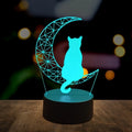 3D LED cat night light glowing in teal on a black base