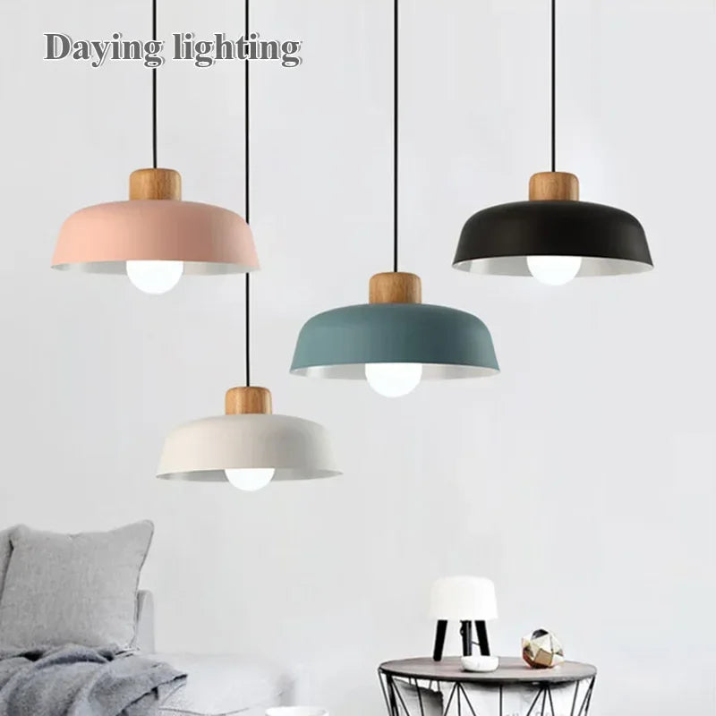 Modern macaron dome pendant lights in living room setting above a sofa
