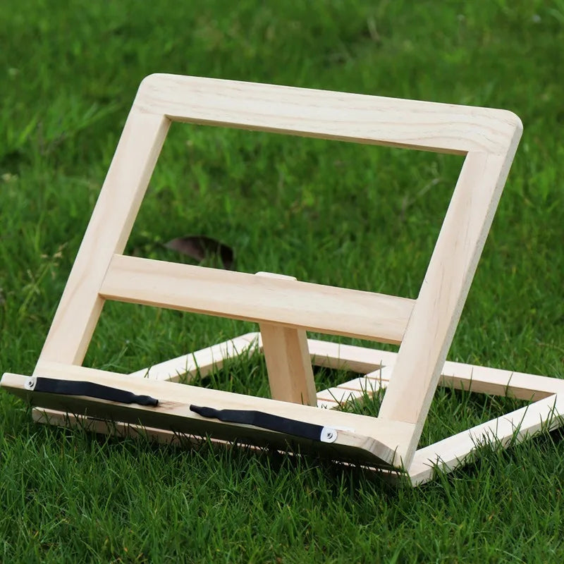 Adjustable wood book stand outdoors showing side view and angle