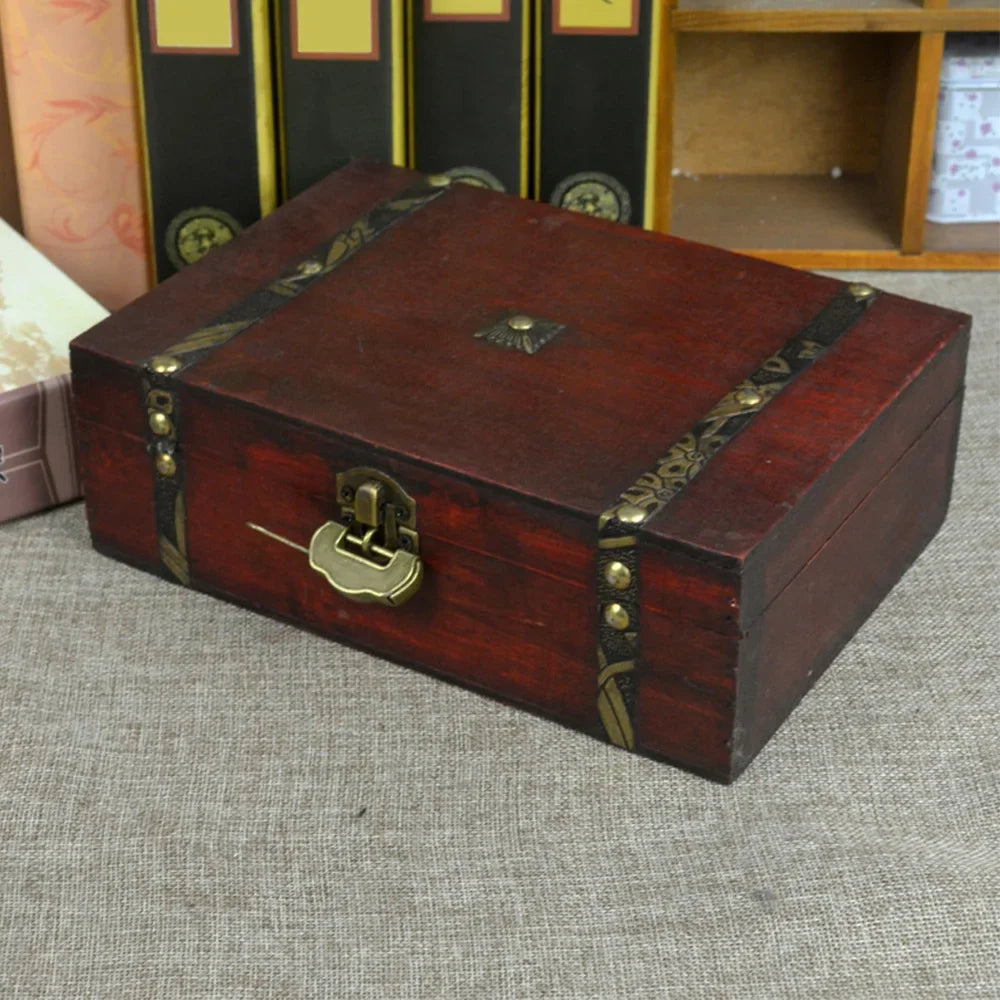 Wooden jewelry or memory box with latch on a home office shelf