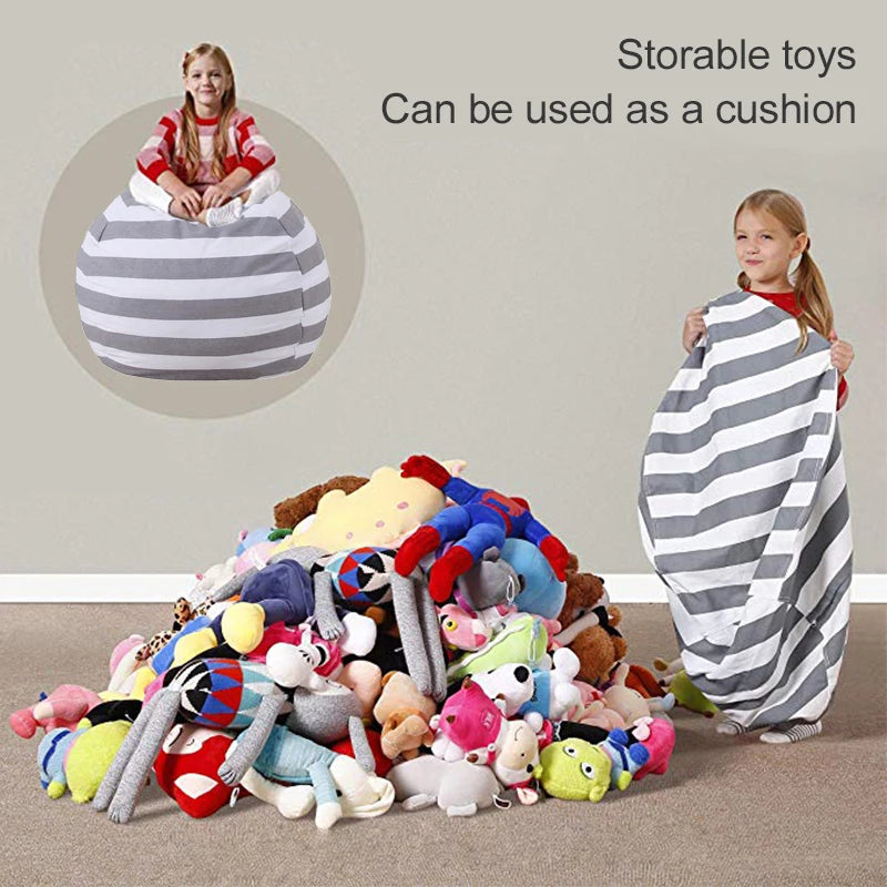 Girl with striped canvas toy storage bean bag and a large pile of plush toys