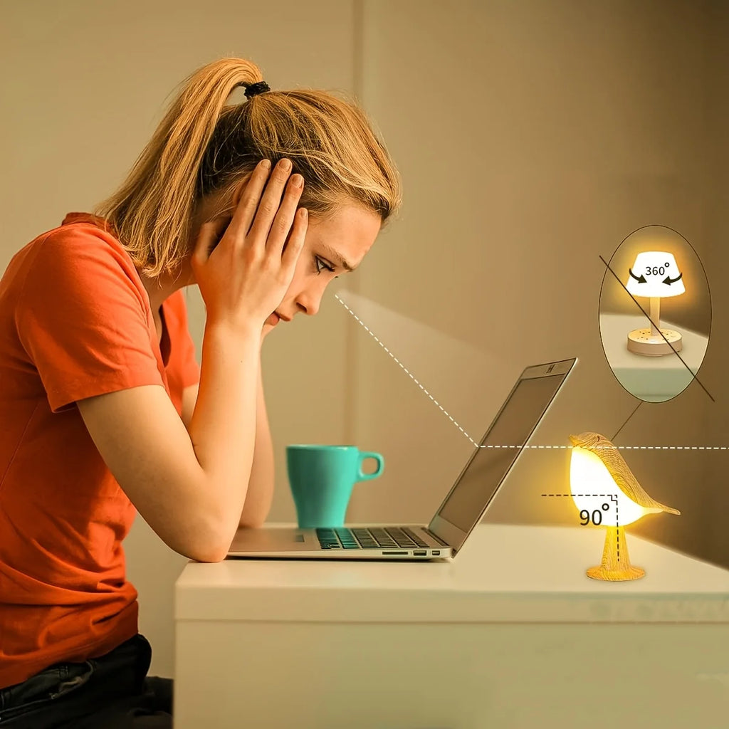 Bird lamp positioned as a reading or work desk light, demonstrating 90-degree angle