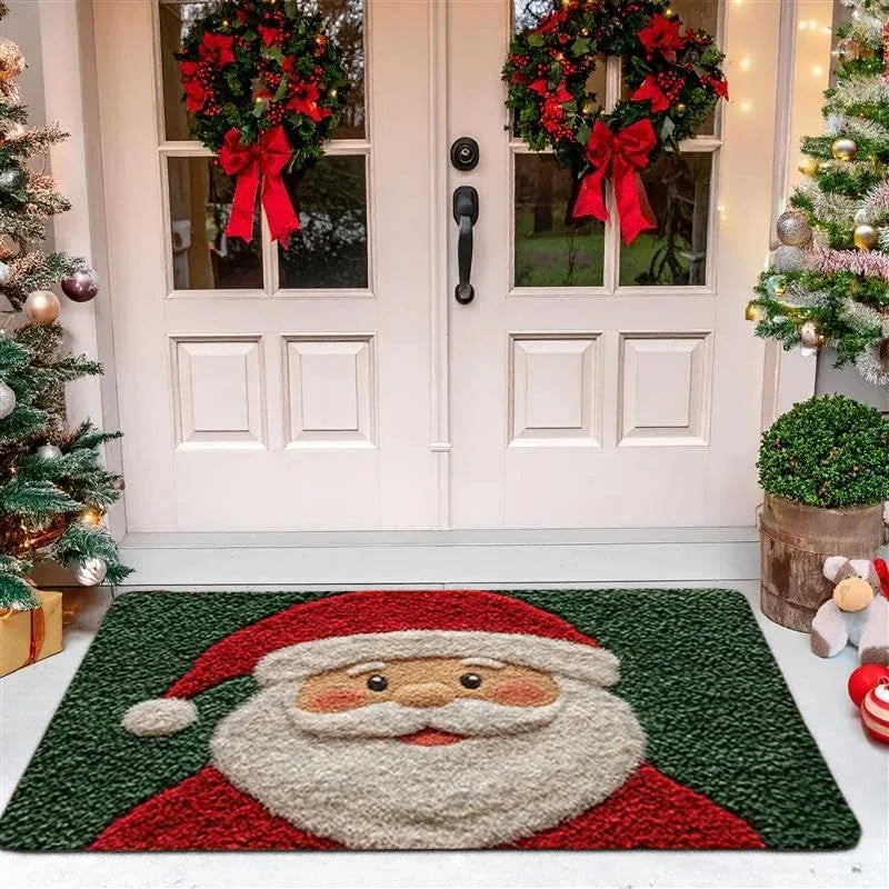 Santa Claus Christmas welcome mat in front of decorated porch door