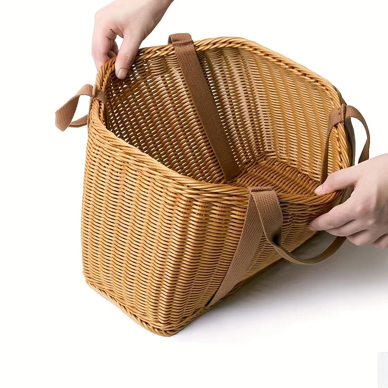 Hands opening and showing inside of rattan basket tote with brown handles