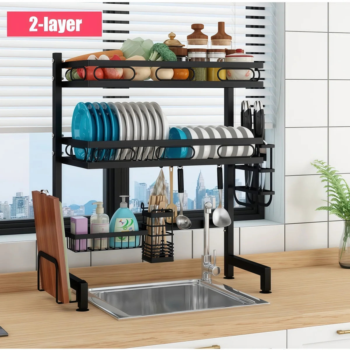 Double layer over-sink dish drying rack with plates, cups, utensils, and accessories organized above a kitchen sink.