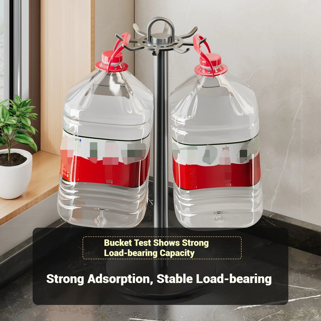 Rotating kitchen utensil holder stand with two large water jugs hanging from the hooks, demonstrating stability