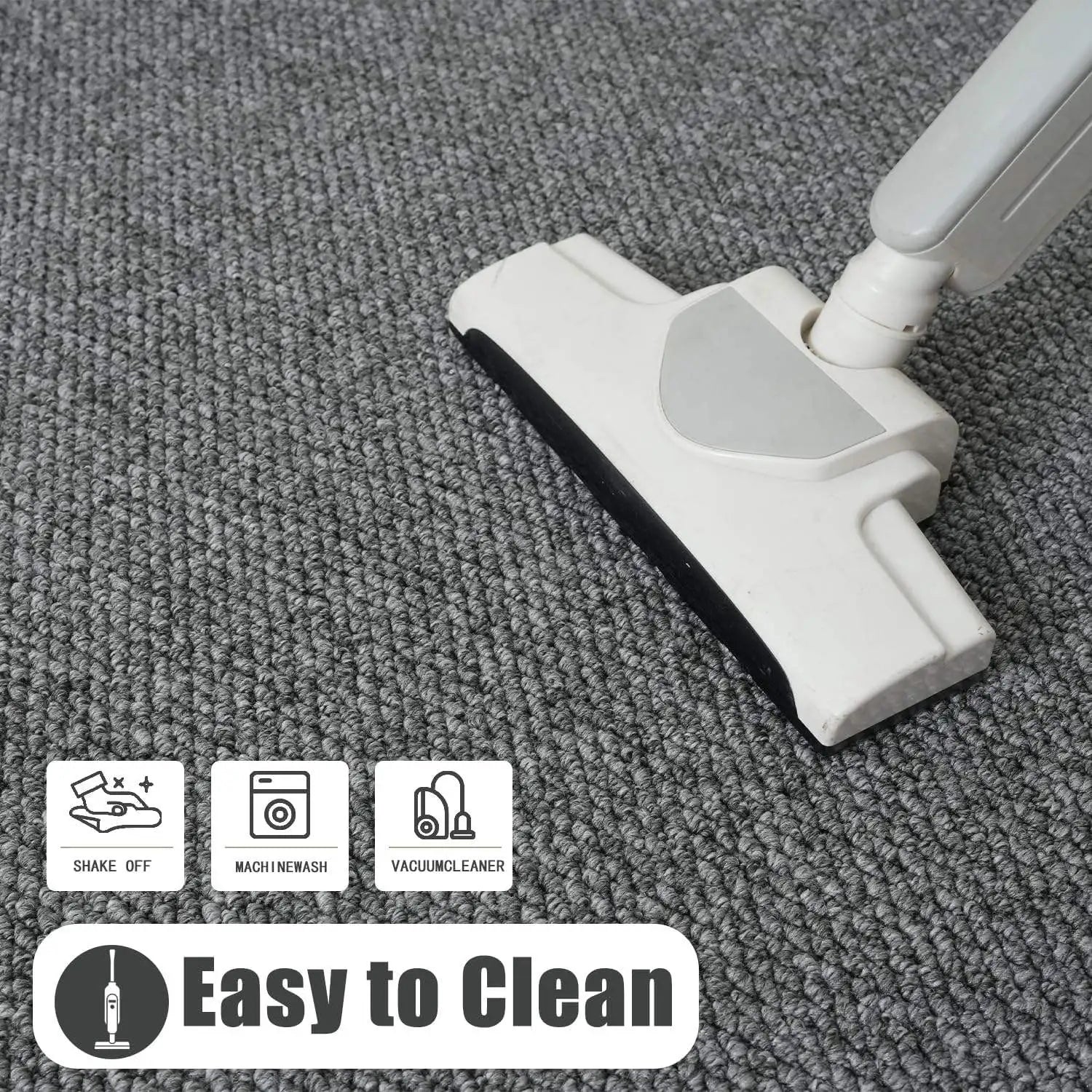 Vacuuming a gray non-slip entry mat, highlighting easy cleaning