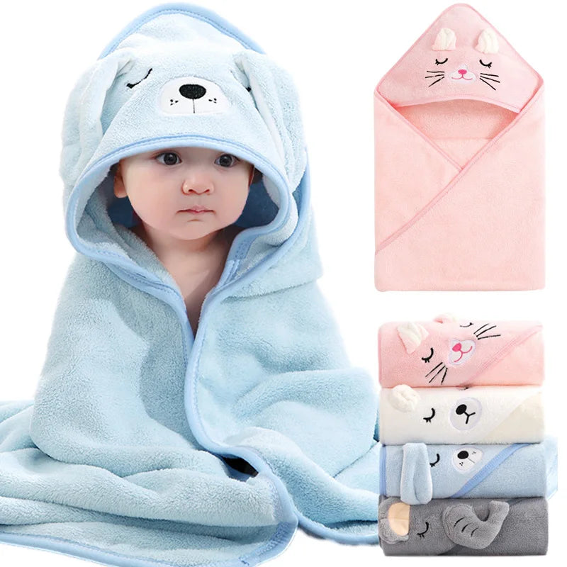 Baby wrapped in blue dog hooded towel, with various animal towel designs shown