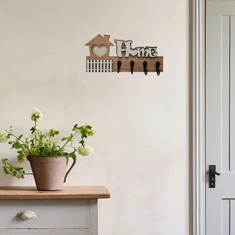 wooden home motif key holder wall hook mounted near an entryway table