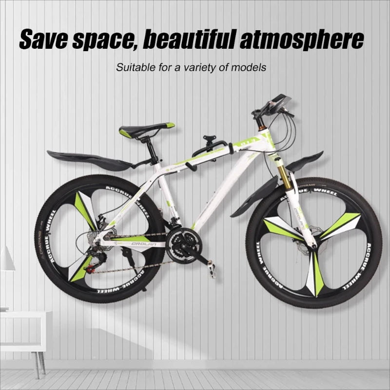 White and green mountain bike hanging on a wall using the foldable wall mount rack in a modern room