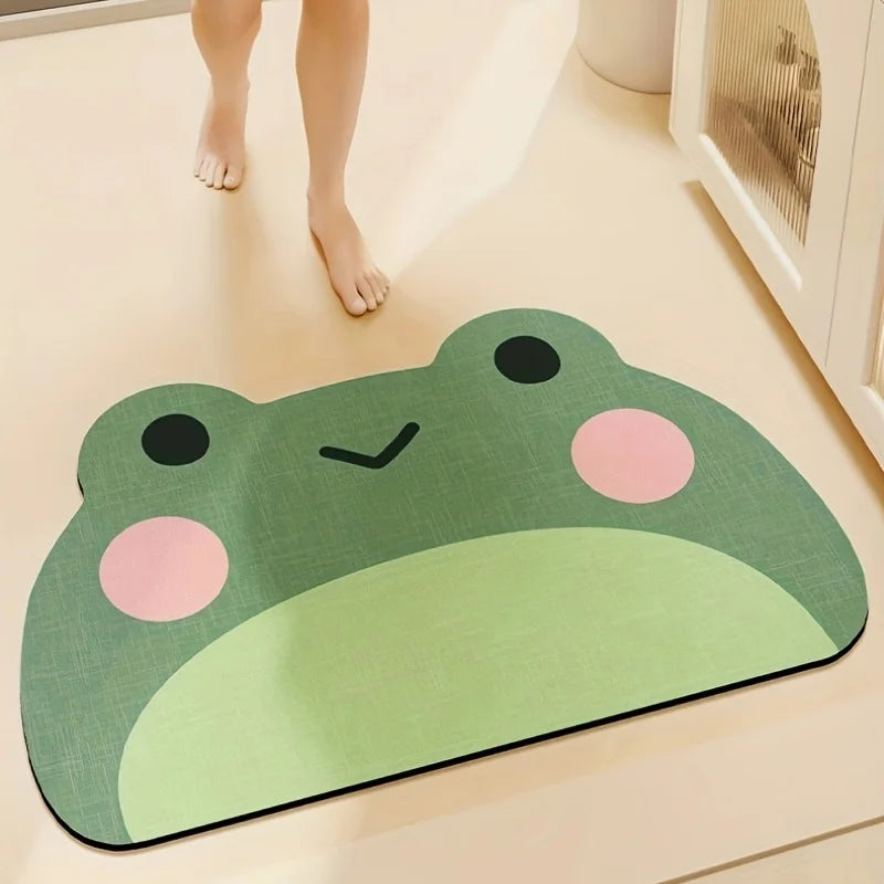 Person standing on a frog shaped bathroom floor mat in a home setting