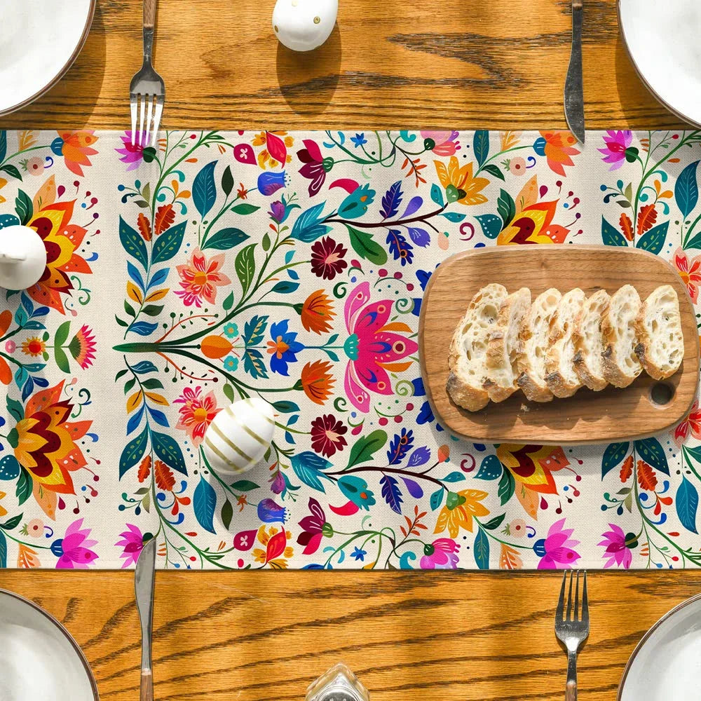 Machine washable floral table runner arranged on dining table with bread and tableware