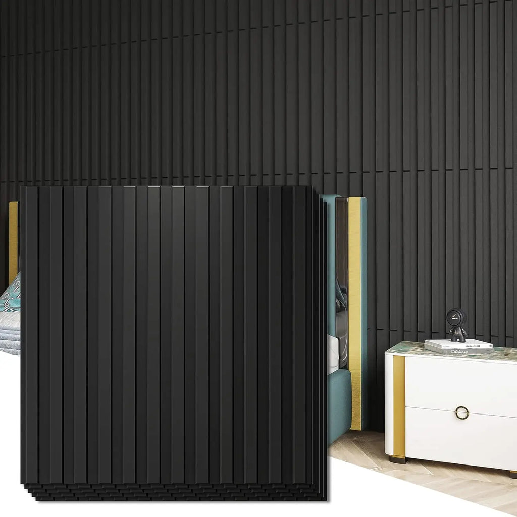 Matte black 3D PVC wall panels styled as a bedroom feature wall