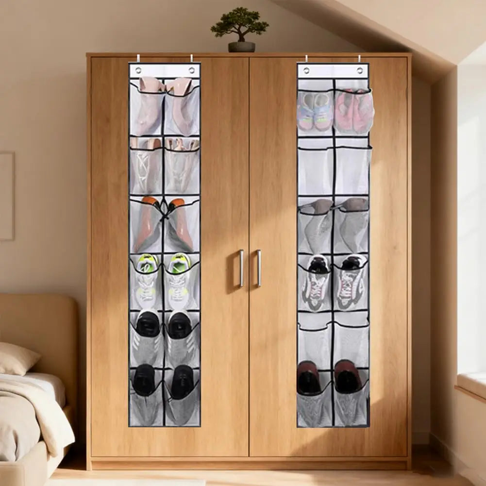 two mesh over-door shoe organizers filled with various shoes hanging on wooden closet doors in a bedroom