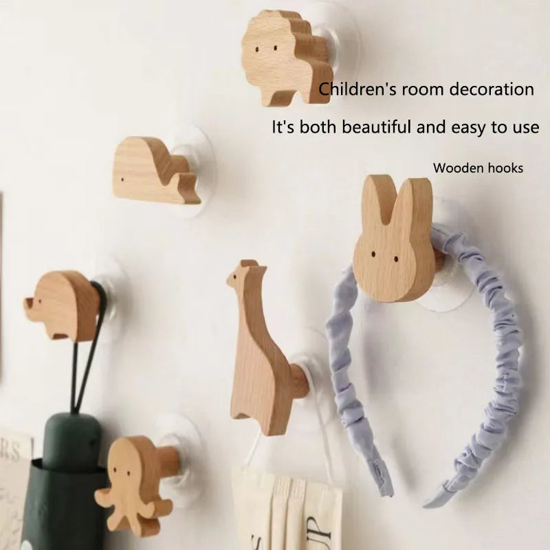 Animal-shaped wooden wall hooks used for children's room decoration