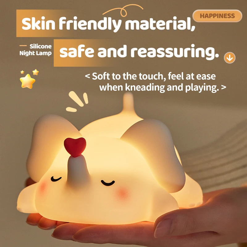 Close-up of elephant silicone night light held in hand, highlighting soft-touch material
