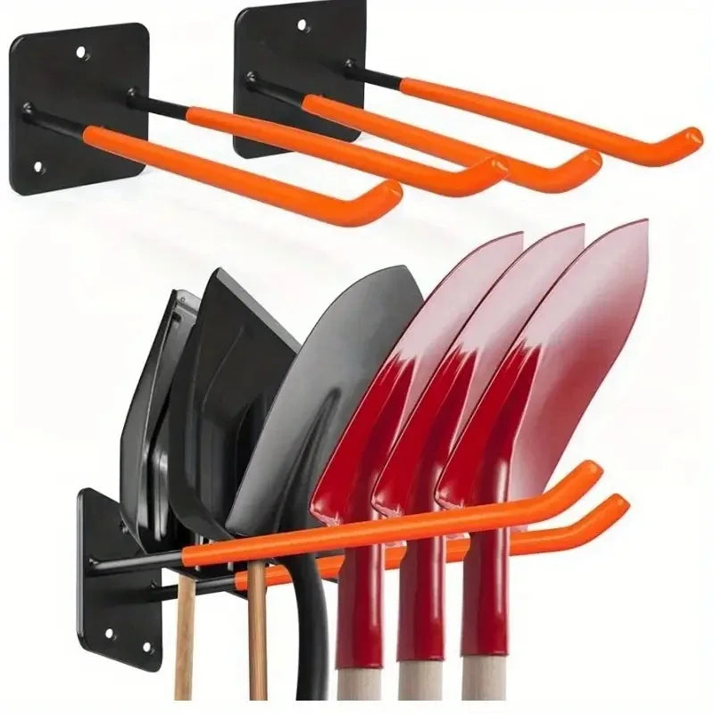 Wall-mounted double hook holding assorted shovels and tools for garage organization