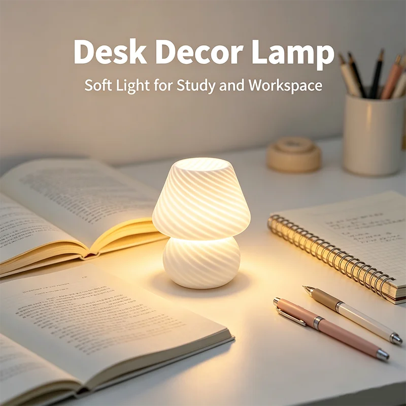 single white mushroom glass table lamp providing soft light on a desk with open books and stationery