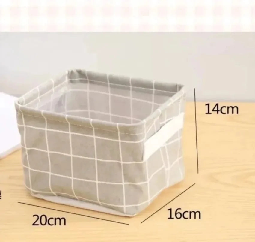 Light grey fabric storage bin with white grid pattern, shown with labeled size dimensions 20x16x14cm