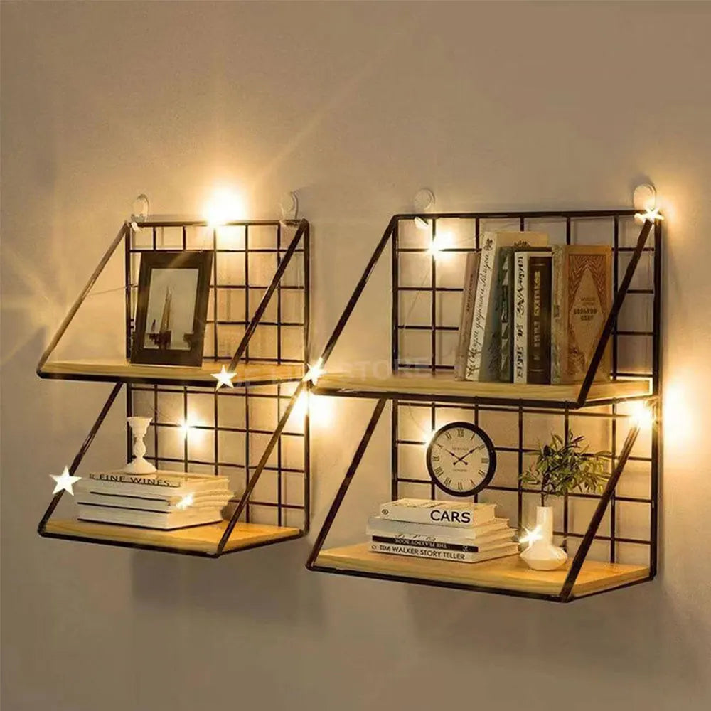 Two black wall shelves with grid frames and wood bases, styled with books, decor, and warm lighting