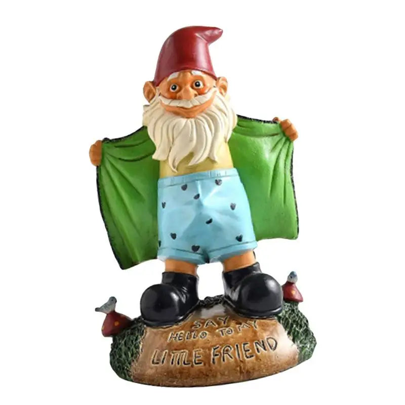 Front view of garden gnome statue in blue heart-patterned shorts, standing on a base with humorous text