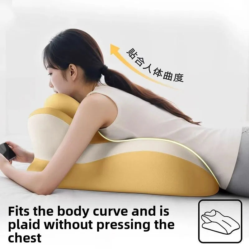 Woman lying on stomach using contoured memory foam backrest pillow